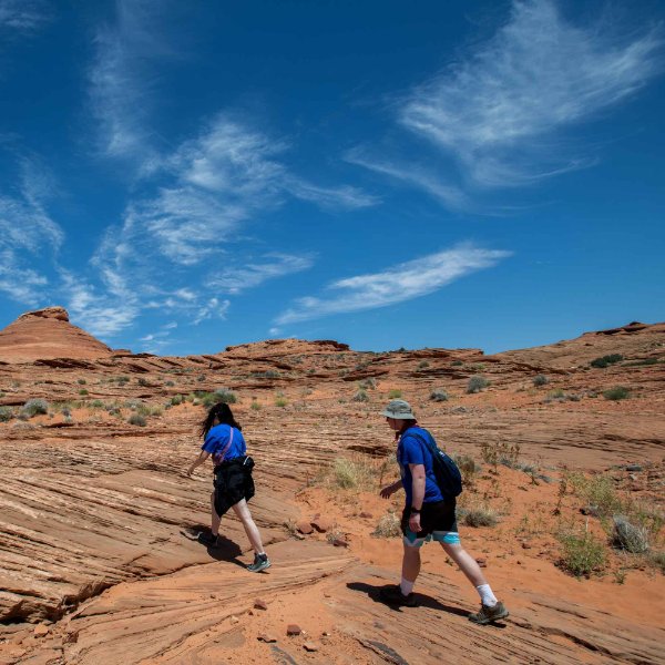 Students Carmen Schot and Joel Vogeli hike The Chains near Lake Powell on the Water in the West trip.