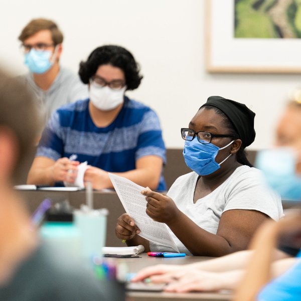 Photo of students, wearing masks, in the classroom.