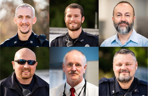 Six GVPD officers with facial hair.