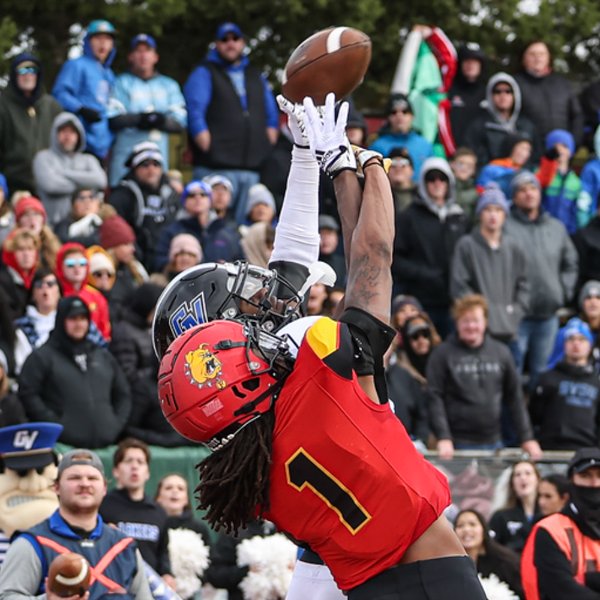 Grand Valley and Ferris State players fight for a pass.