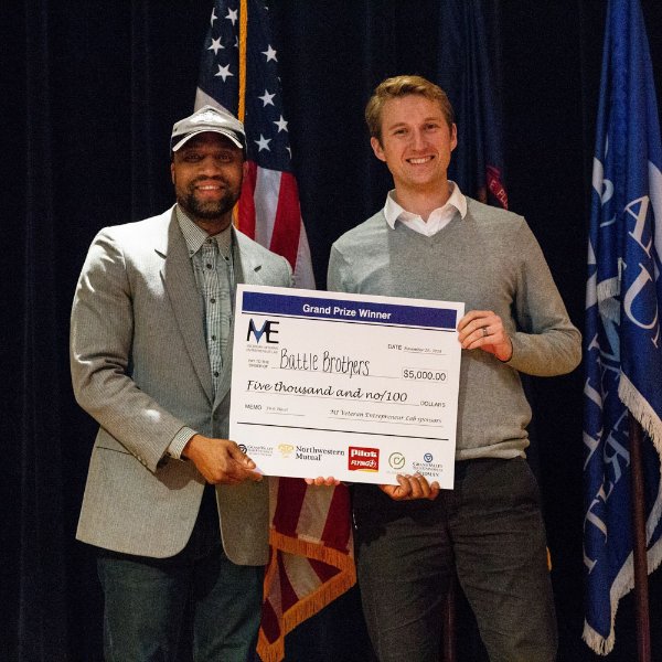 Andrew Weiss, right, won $5,000 through the Michigan Veteran Entrepreneur-Lab at GVSU.