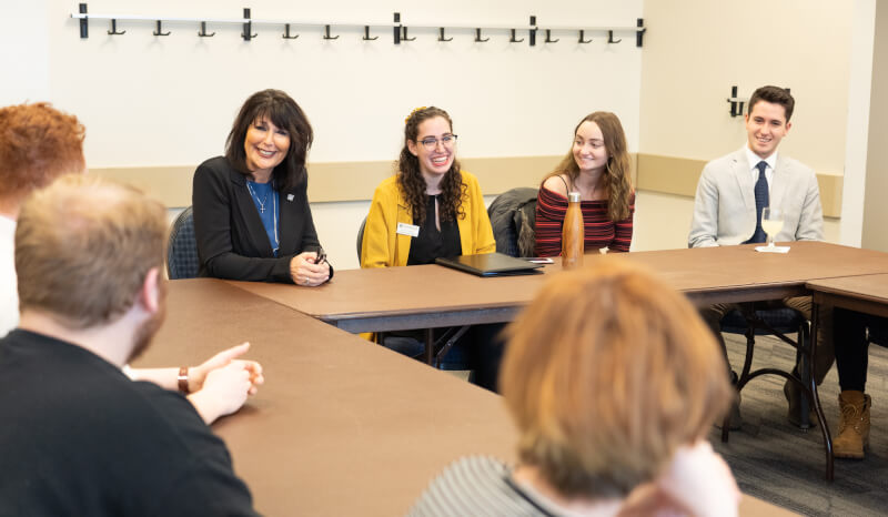 Philomena Mantella meets with student senators in the Kirkhof Center. She is seated to the left of Student Body President Rachel Jenkins.