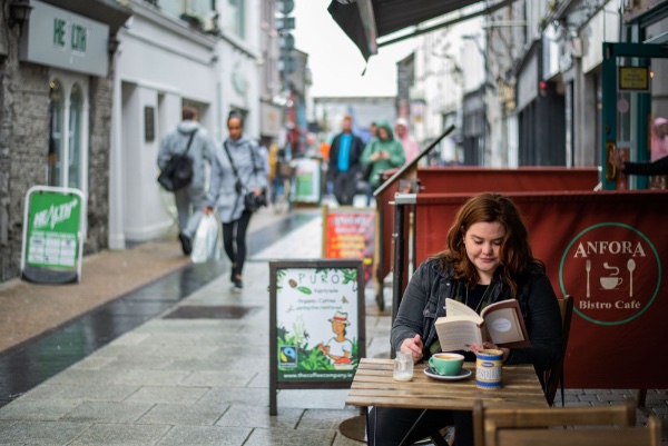 Picture of GVSU senior Kelley Sommers at a streetside cafe in Galway, Ireland.
