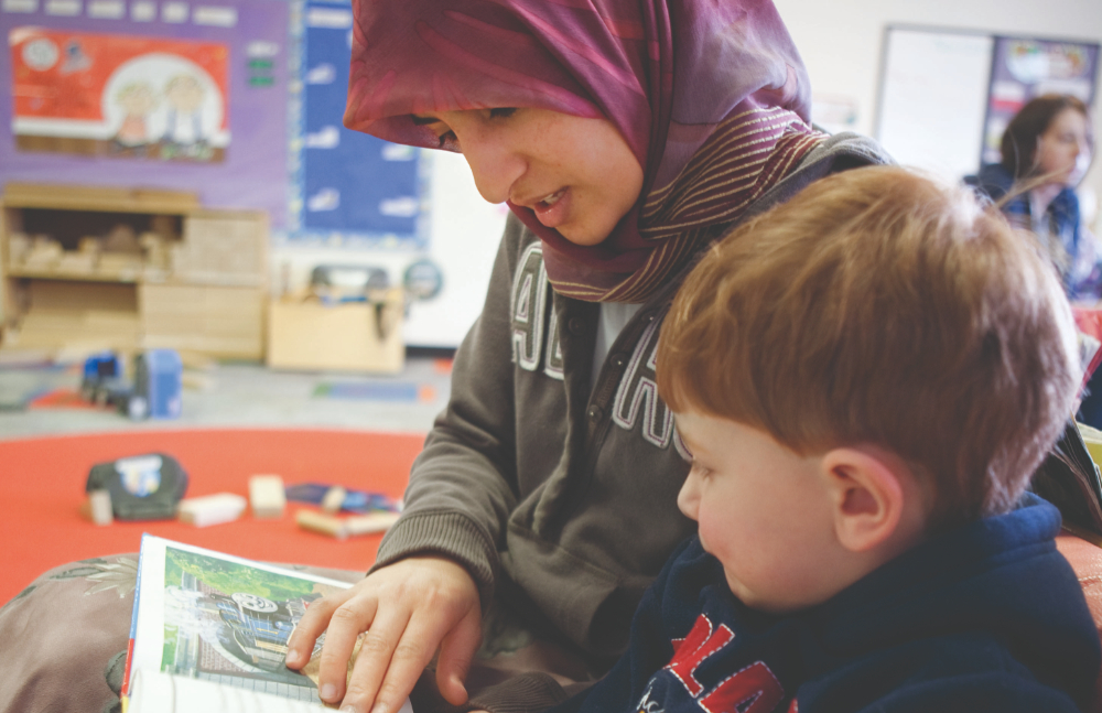 student reading to a child