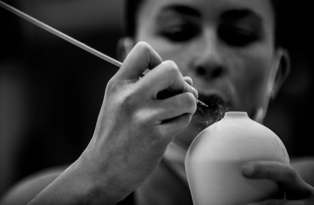 Veronica Clapp works on a ceramics piece in the Calder Arts Center.