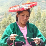 young Peruvian woman weaving