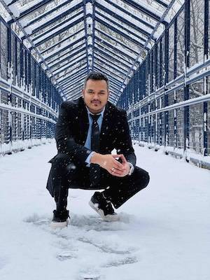 Aditya Dube on Little Mac Bridge in snowfall