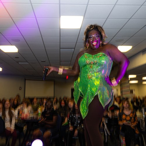 Drag Performer dressed as a fairy performs for crowd