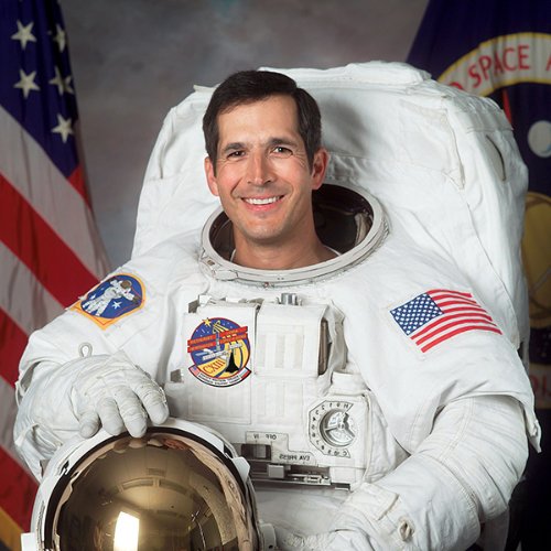 Astronaut John Herrington dressed in space flight suit