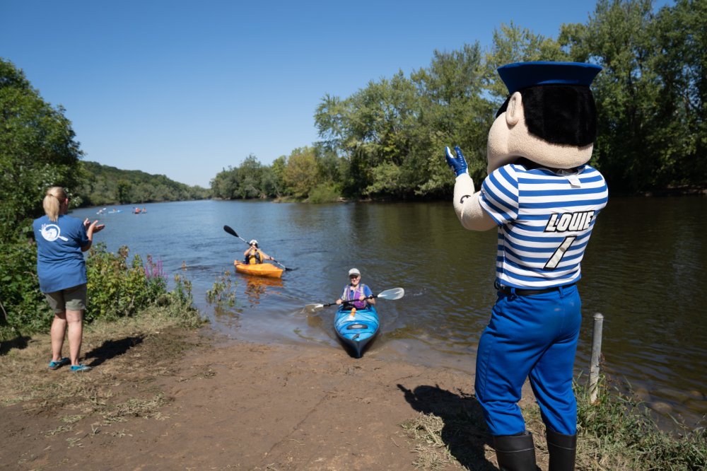 Louie the Laker Greeting Kayaks along the Grand River during Big Splash 2020