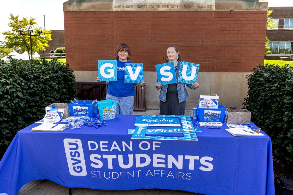 Dean of Students office staff with photo booth supplies