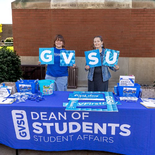 Dean of Students office staff with photo booth supplies