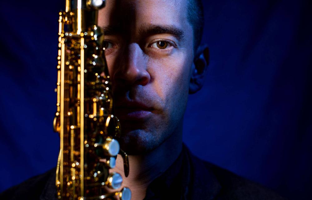 dan graser holding saxophone