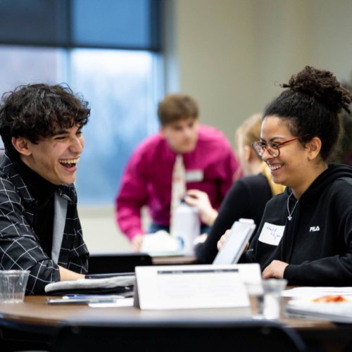 Pictured is two students at an Elect Her Event