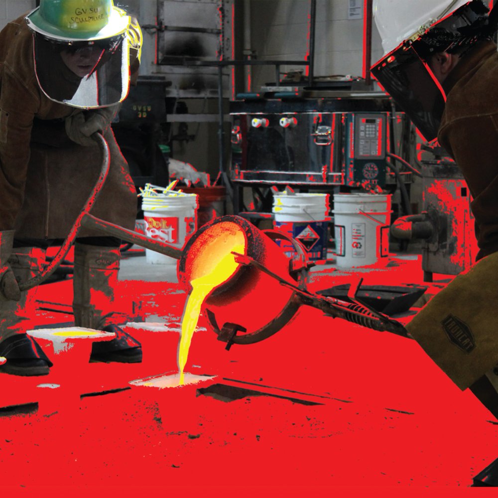 Sculpture Students Pouring Iron
