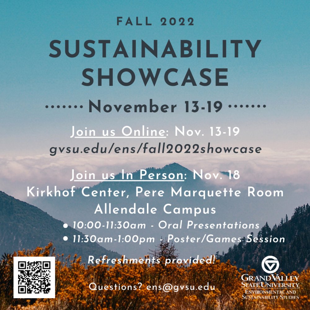 mountain scene with orange flowers and clouds in the distance