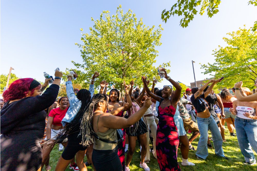Students dancing on the Kirkhof Lawn at the Labor Day Cookout