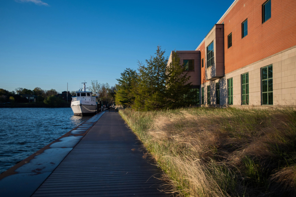 Lake Michigan Center on right next to channel with research boat docked in background