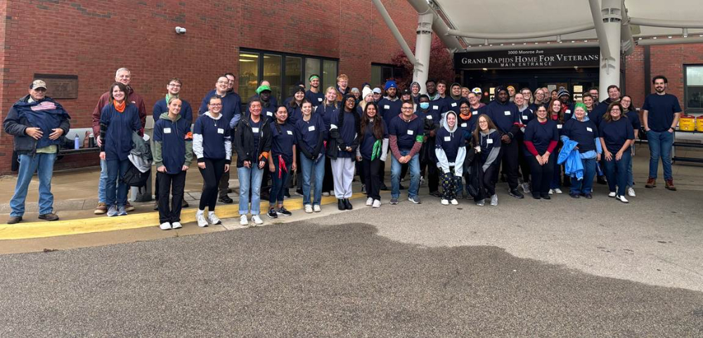 large group of people standing in front of Michigan Veteran Homes at Grand Rapids