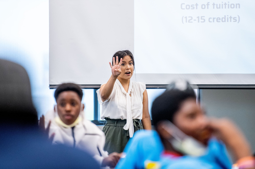 Estefany Paniagua-Pardo, career navigator, gives a presentation about the Battle Creek Pipeline Scholars at the camp.