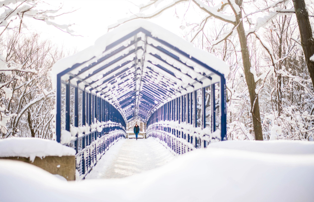 Little Mac Bridge with snow on blue covering and snowbank in front