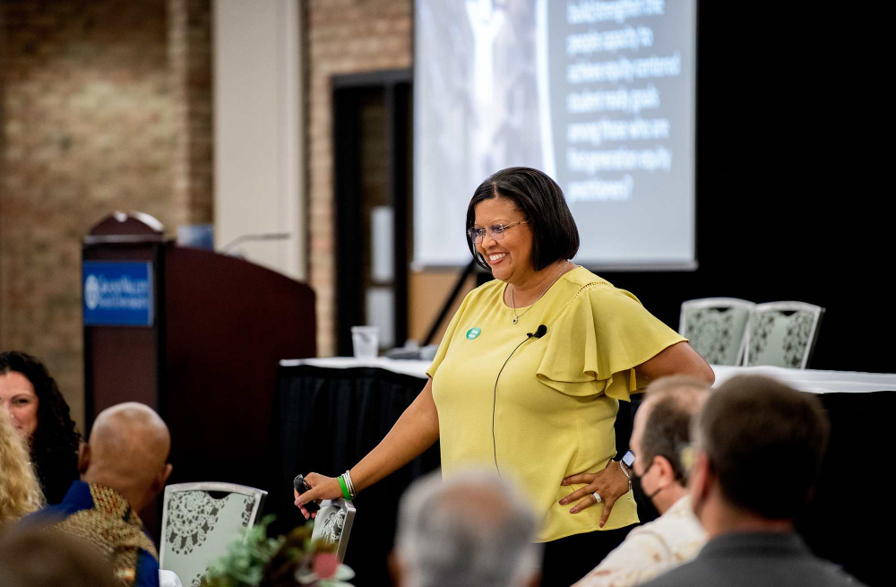 Tia Brown McNair, vice president for Diversity, Equity and Student Success at the American Association of Colleges and Universities, speaks with participants in the audience at the keynote address at the 28th annual Fall Teaching and Learning Conference.