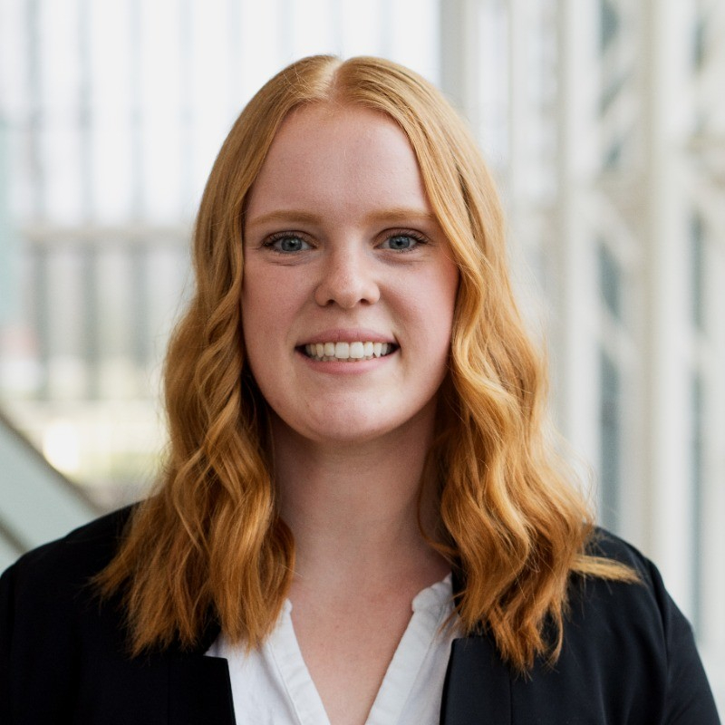 Laken Chapin portrait taken inside the Mary Idema Pew Library