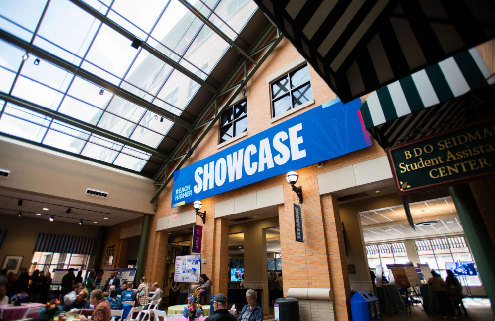 DeVos Center atrium with big blue banner reading "Showcase" at top