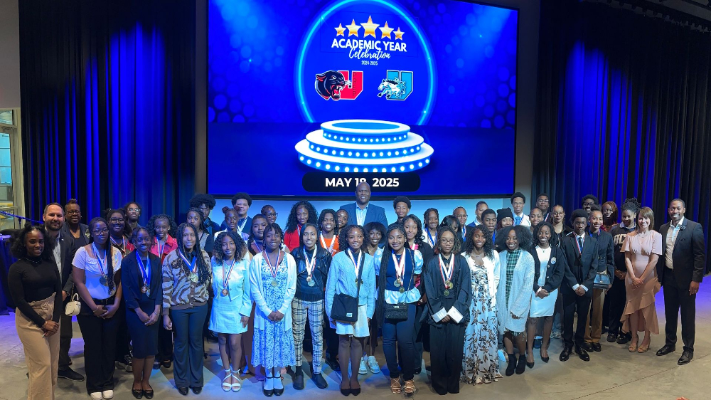 large group of students and staff at the TRIO Upward Bound celebration in the Michigan Central