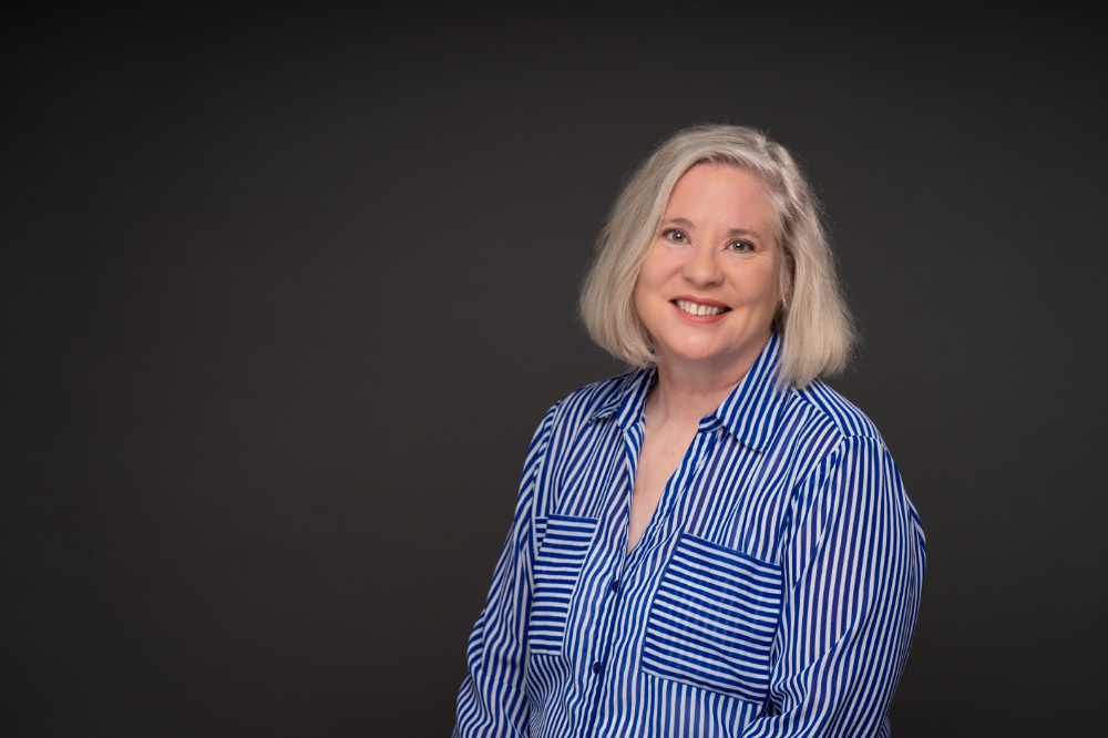 Kathy Agee in a striped blue shirt