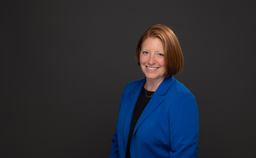 Shannon Owen in blue jacket and black shirt