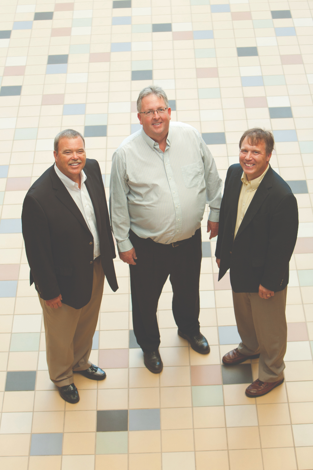 from left are Bart Merkle, Bob Stoll and Andy Beachnau standing in the Kirkhof Center, photo taken from above