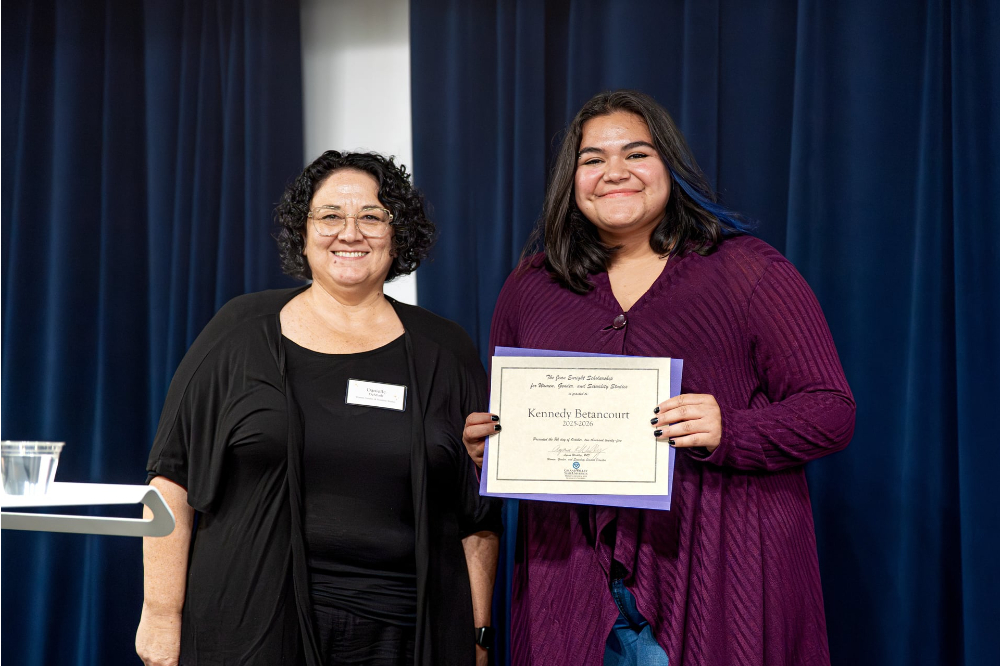Danielle DeMuth stands next to Kennedy Bentancourt