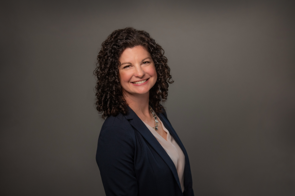 Jessica Weare portrait in dark jacket and light shirt