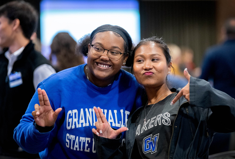 Students Chloe Duncan, left, and Emily Par pose for a photo after speaking at the Listen. Learn. Lead. State of the Student event held at Eberhard Center.