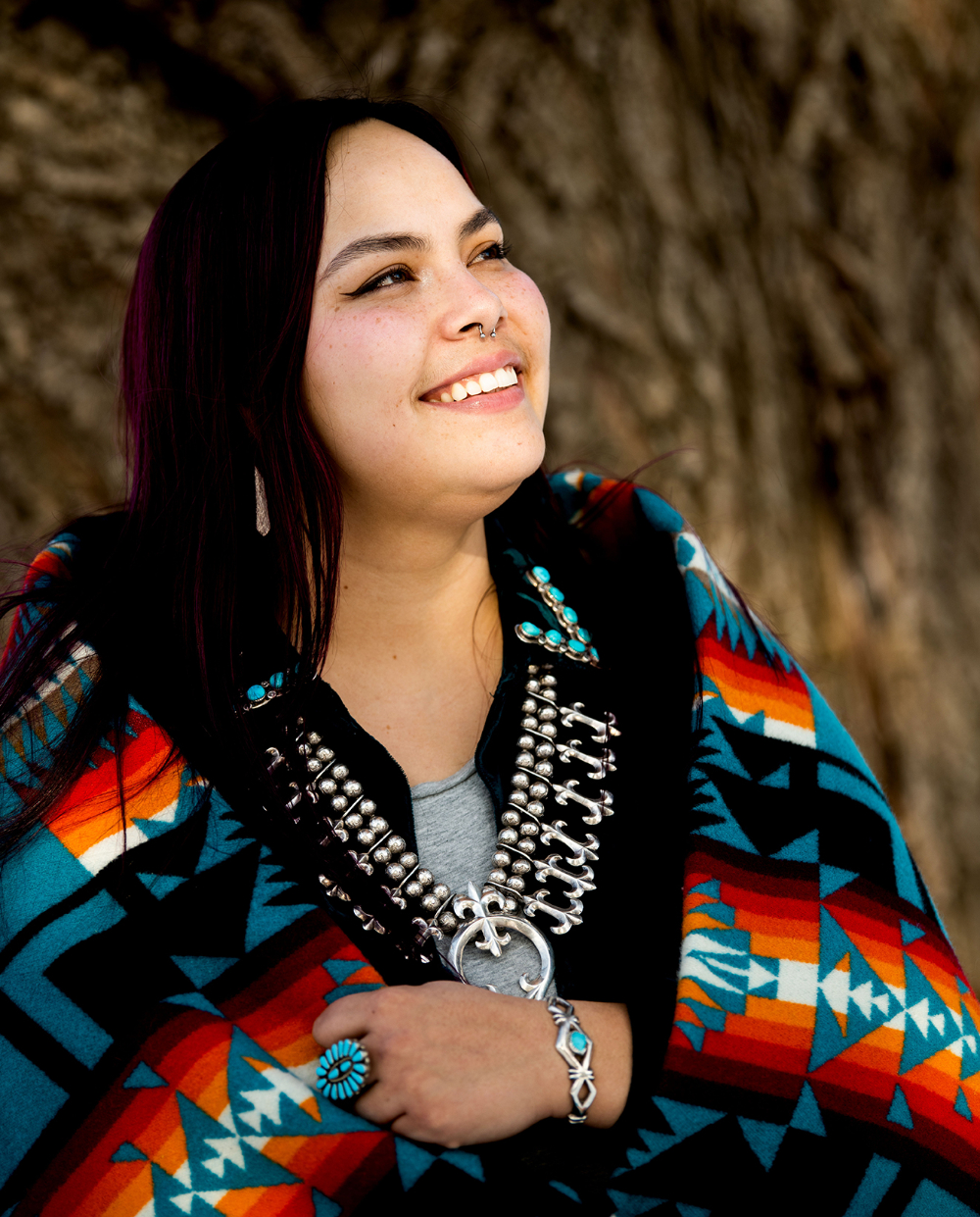 Ayebah Wilson in traditional Native print shawl and jewerly