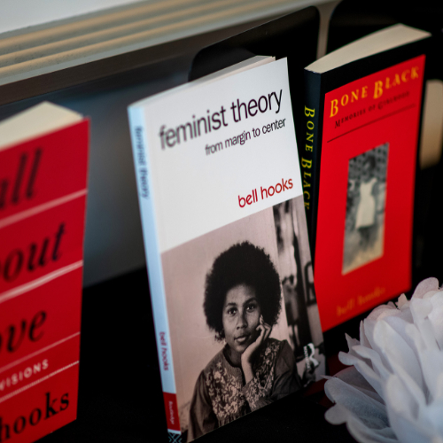 books lined up on display, all written by bell hooks