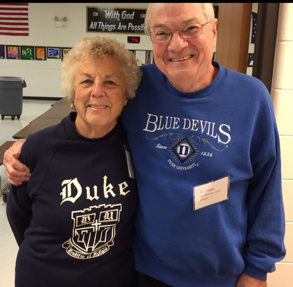 two people in Duke University sweatshirts