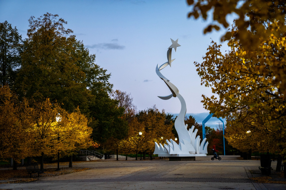 fall photo of sculpture ahead of Transformational Link on Allendale Campus