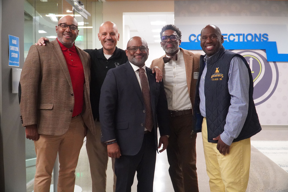 five men standing in row