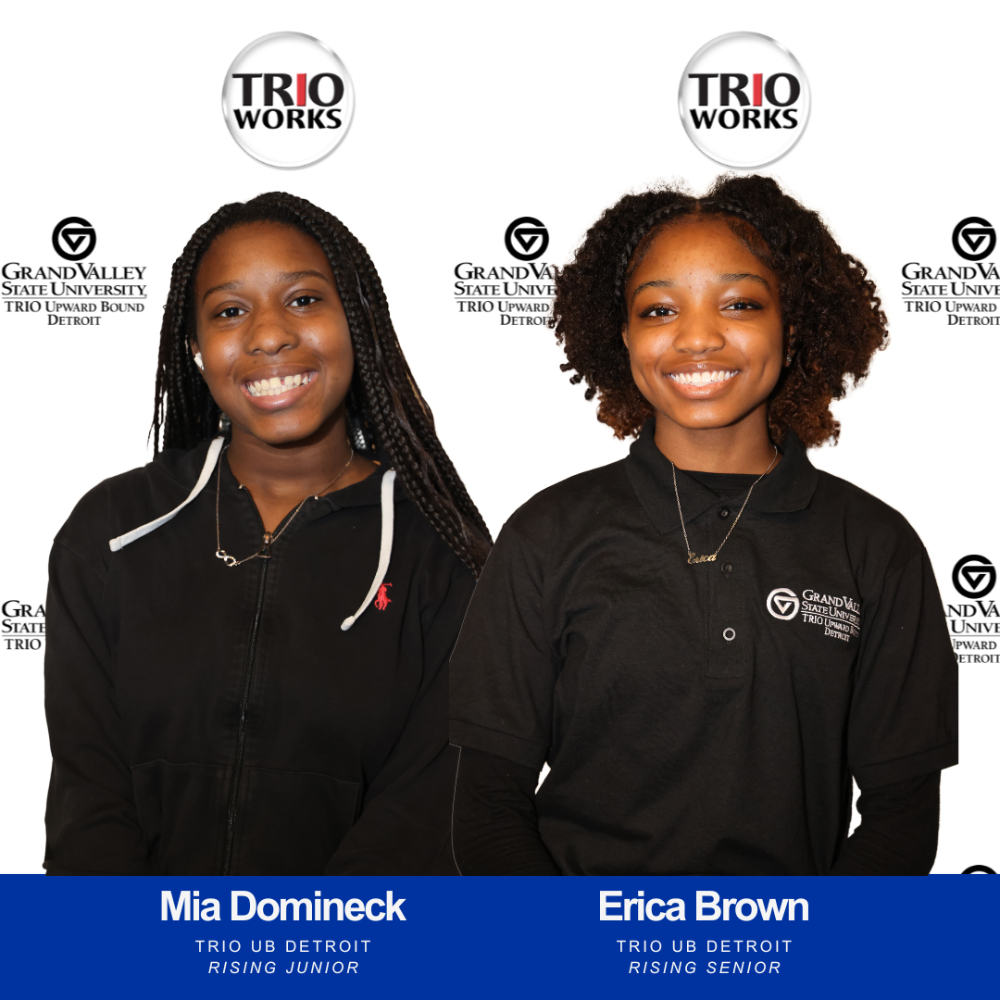 Mia Domineck, left, and Erica Brown in front of a TRIO Works, GVSU backdrop