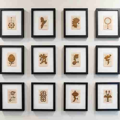 A grouping of framed images