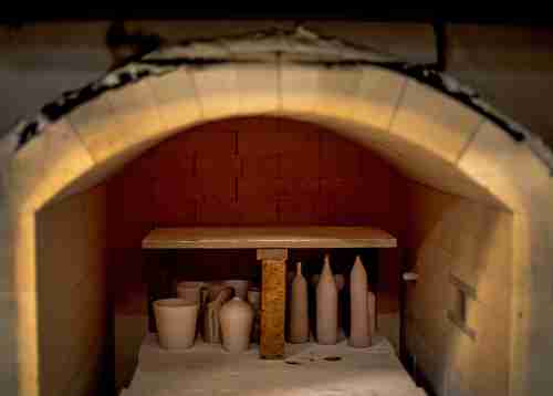 Ceramic vases and vessels in a kiln