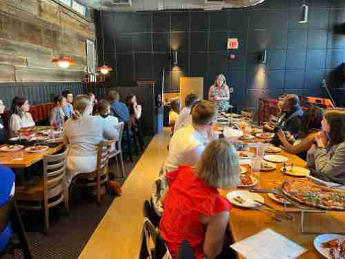 Alumni gather in a restaurant in Washington DC