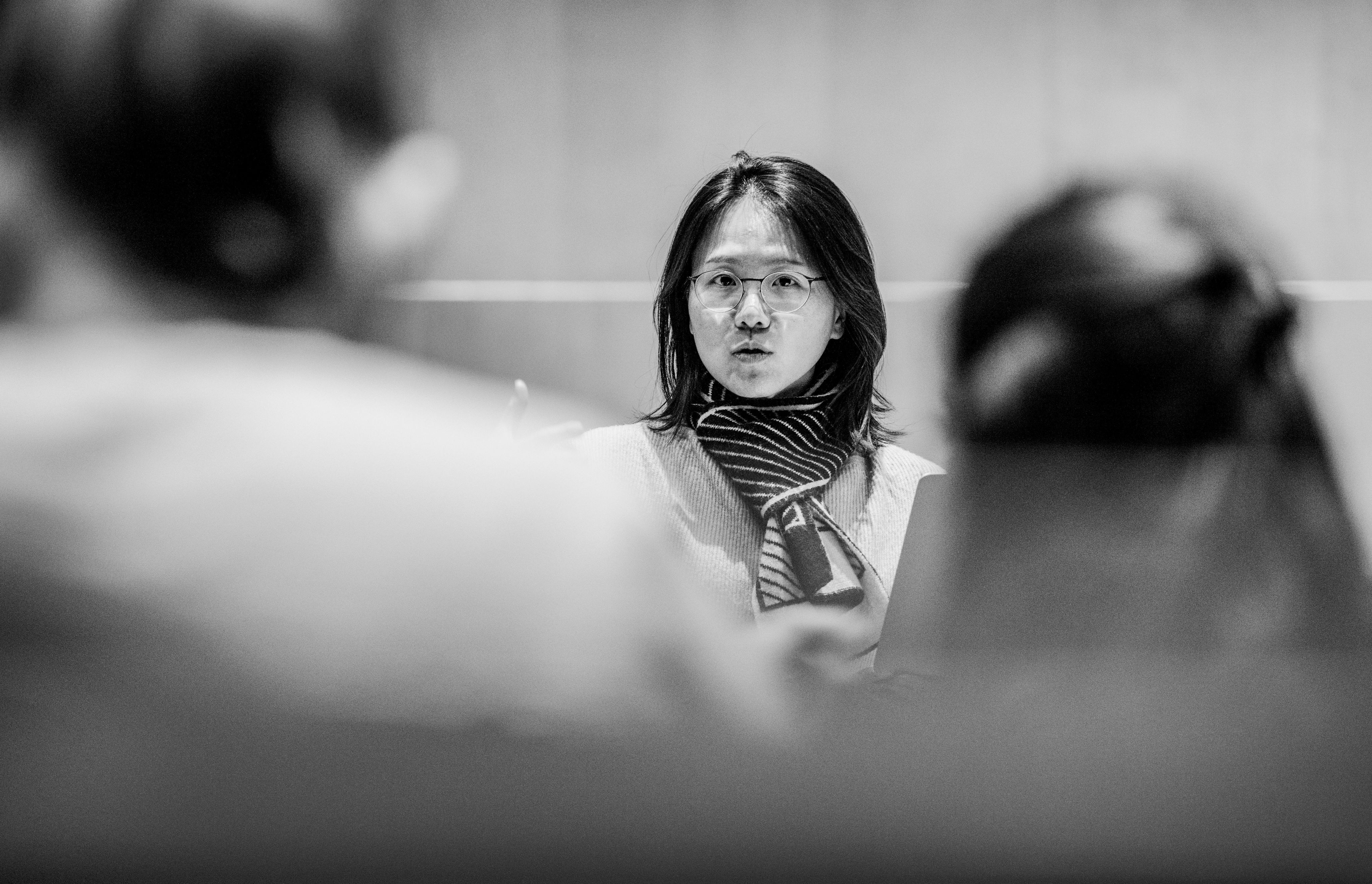 Sookkyung Cho is pictured speaking to two students