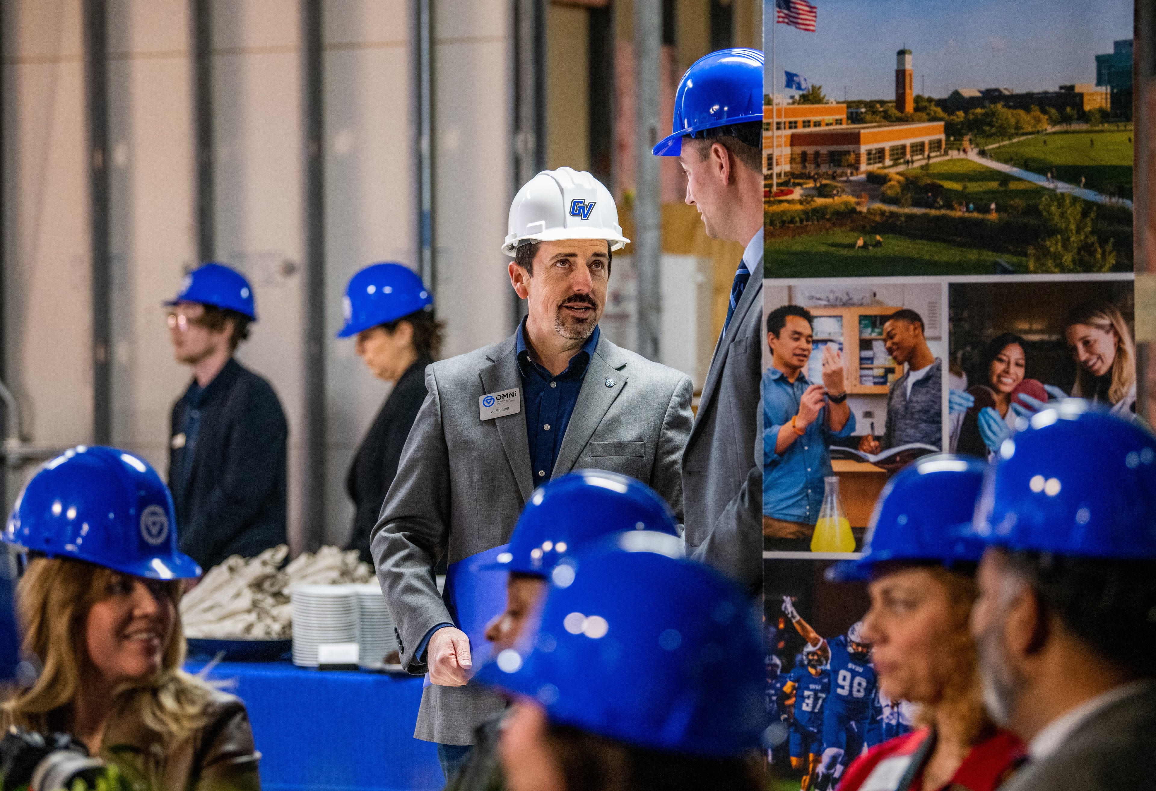 people in hard hats on a construction site