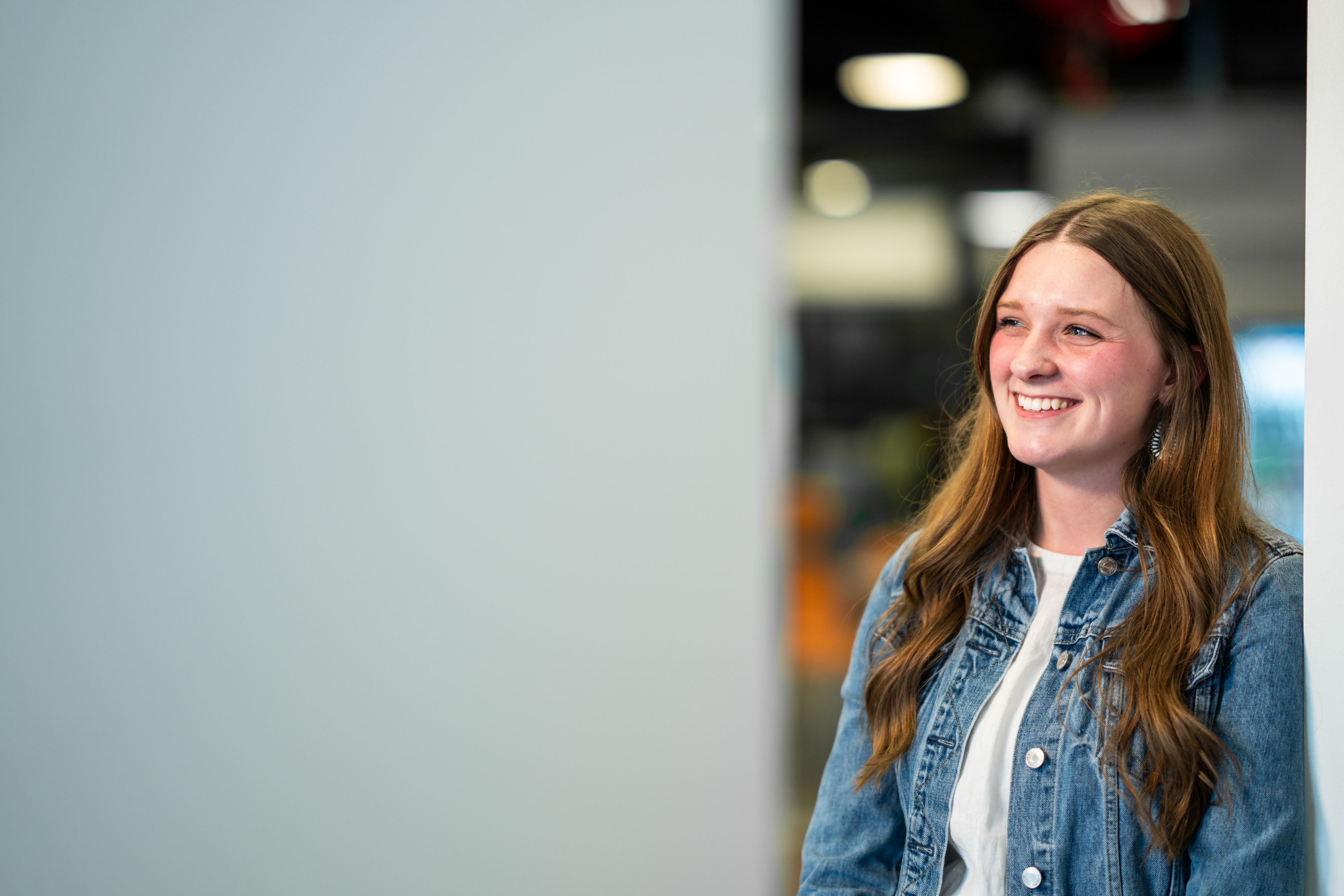 Lexus Baxendale in a denim jacket, white shirt