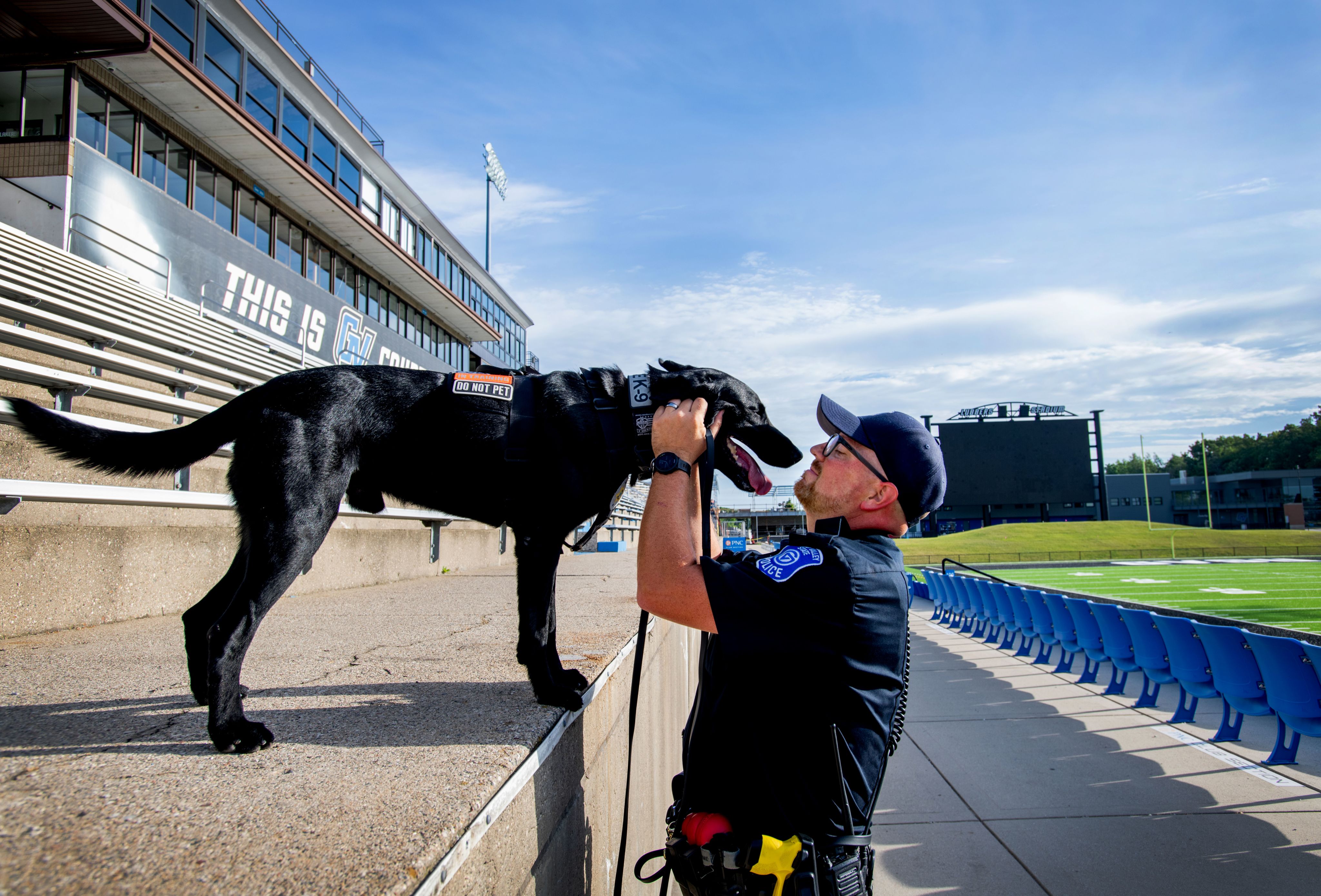 GVPD Officer Paul Weaver and Scout are pictured at Lubbers Stadium