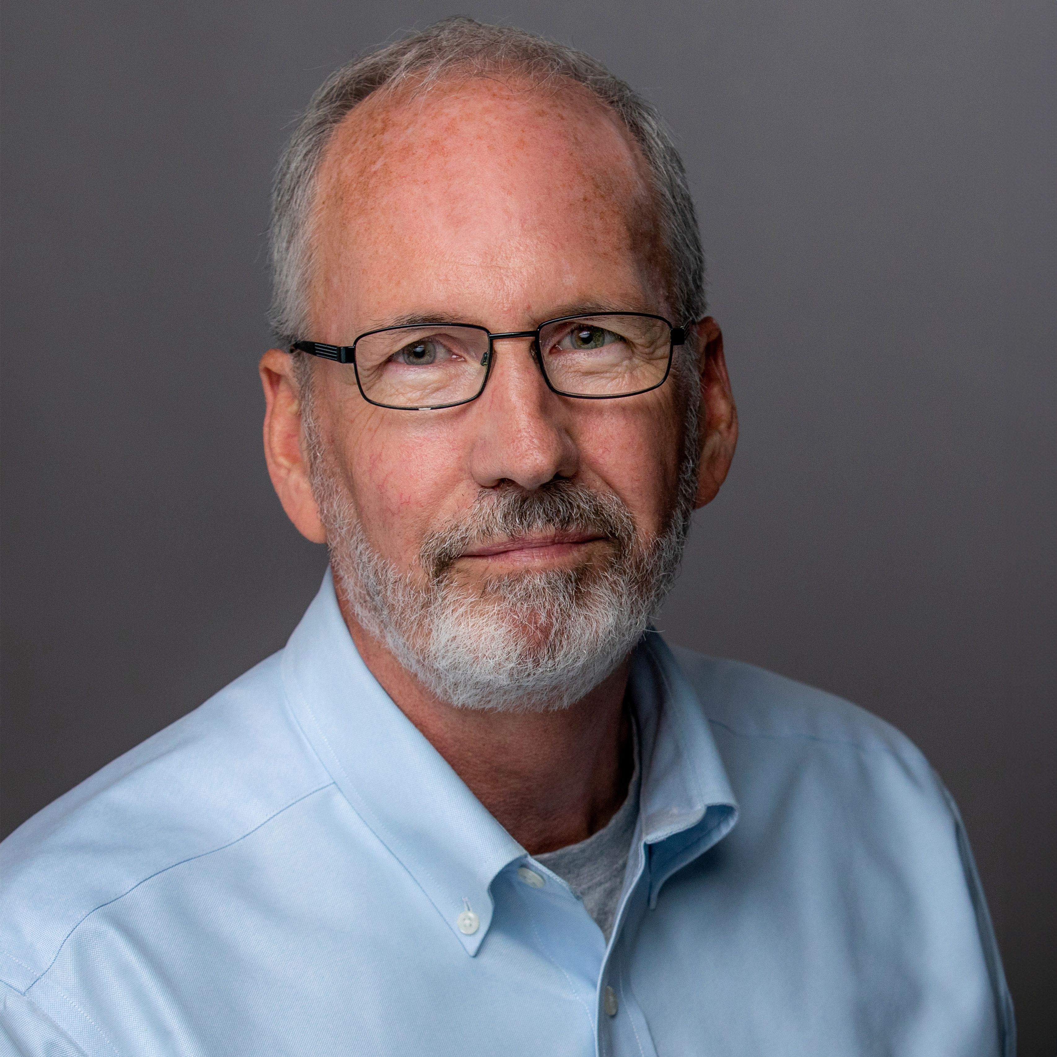 David LeFurge-McLeod in light shirt, smiling
