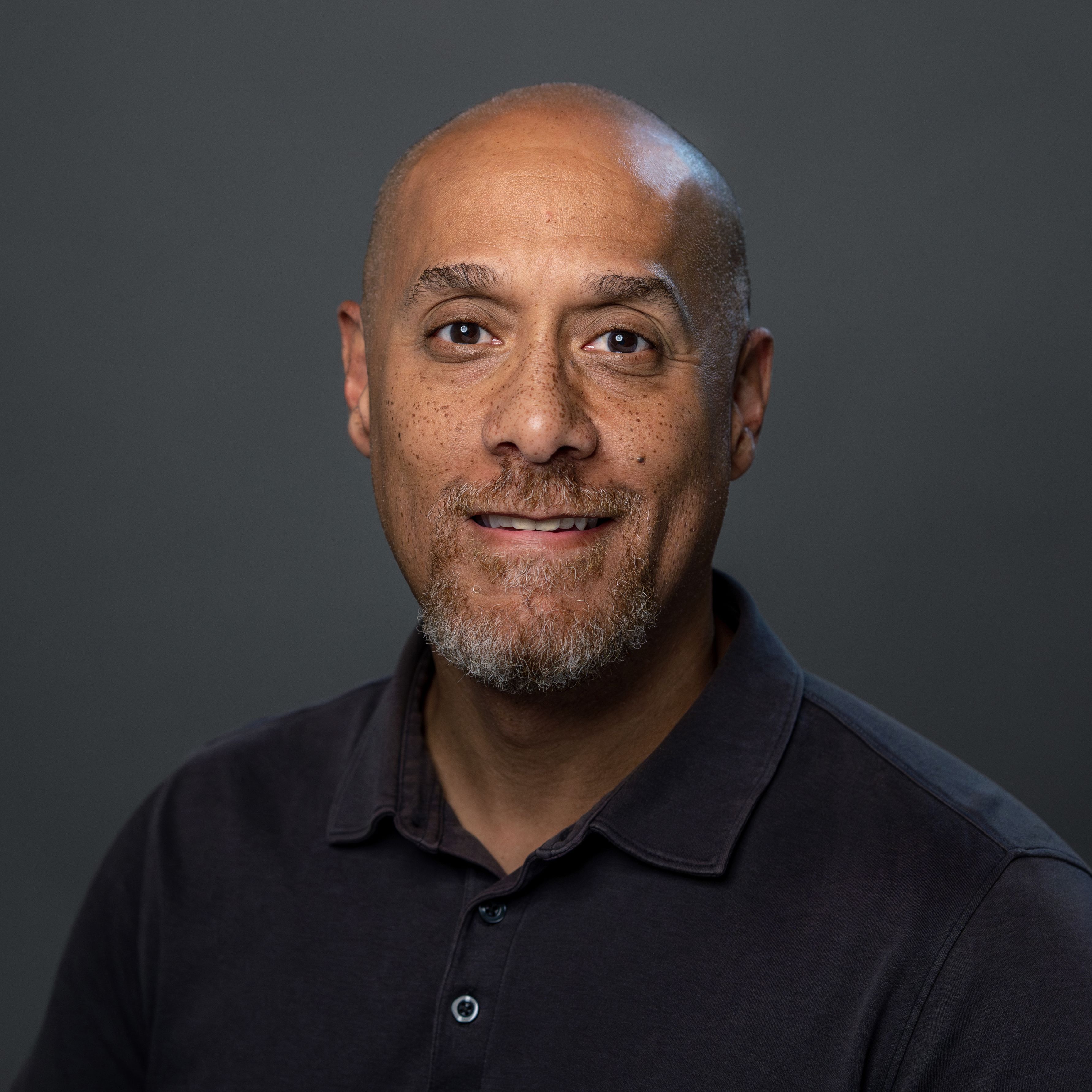 Dark gray background with placeholder avatar